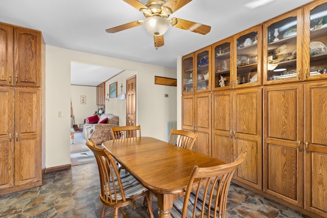 dining room with ceiling fan