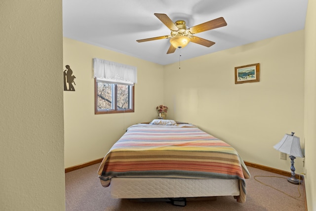 bedroom featuring ceiling fan and carpet floors