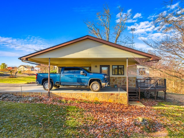 view of property exterior featuring a carport