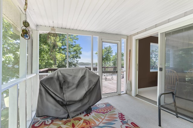 sunroom / solarium with wooden ceiling