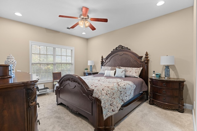 carpeted bedroom featuring ceiling fan