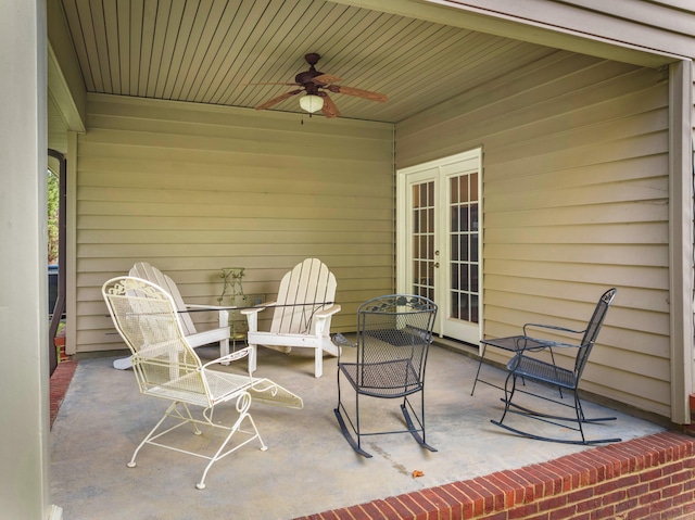 view of patio with french doors and ceiling fan