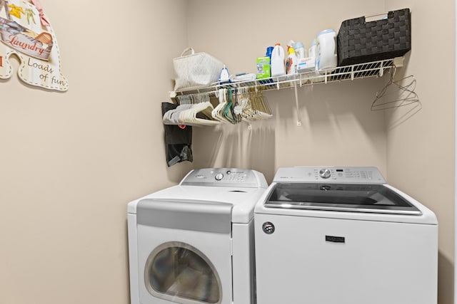 laundry room featuring independent washer and dryer