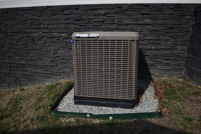 exterior details with central air condition unit