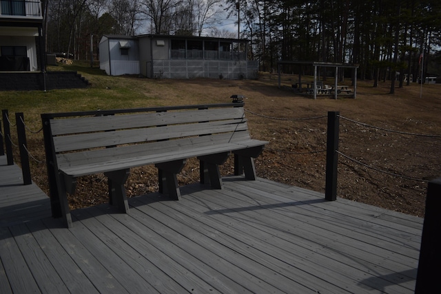 deck featuring a yard