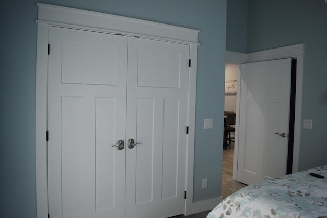 bedroom with a closet and light wood-type flooring