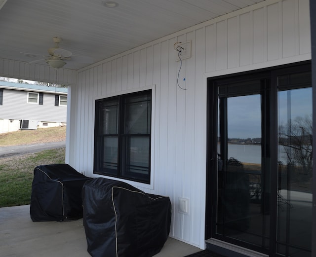 view of patio with a grill and ceiling fan