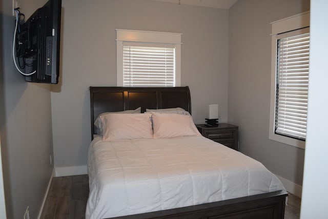 bedroom featuring dark hardwood / wood-style floors