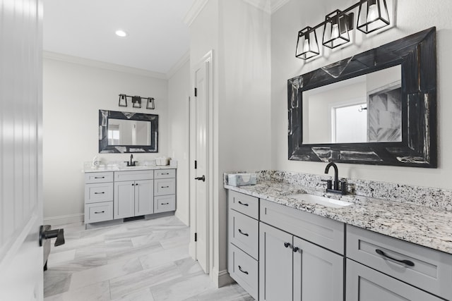 bathroom with vanity and crown molding