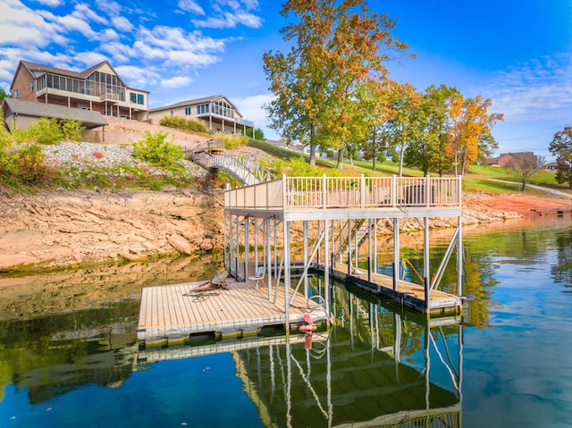 dock area with a water view