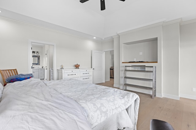 bedroom with ceiling fan, light hardwood / wood-style flooring, a high ceiling, and ensuite bath