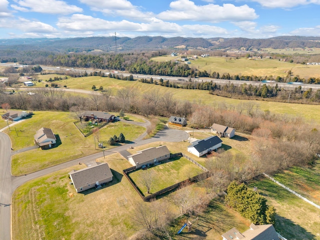 birds eye view of property featuring a rural view and a mountain view