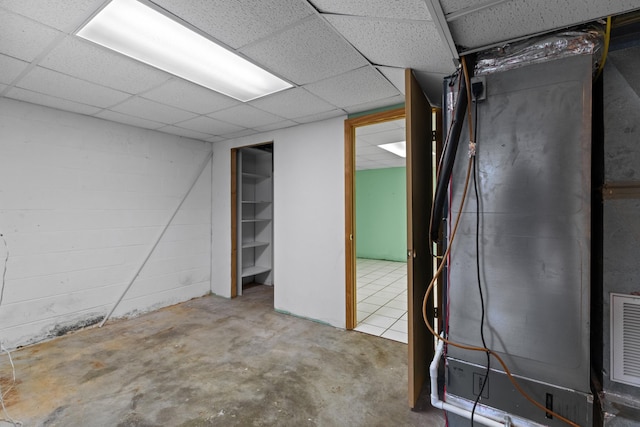 2757 Bethel Rd, Morristown, TN 37813 - basement with a paneled ceiling and concrete block wall