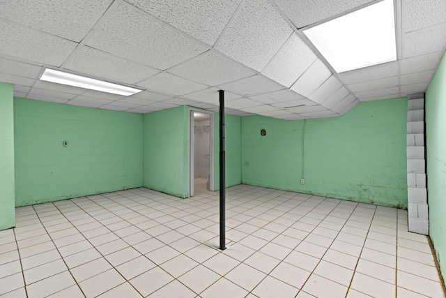 2757 Bethel Rd, Morristown, TN 37813 - finished basement with a drop ceiling, concrete block wall, and light tile patterned floors