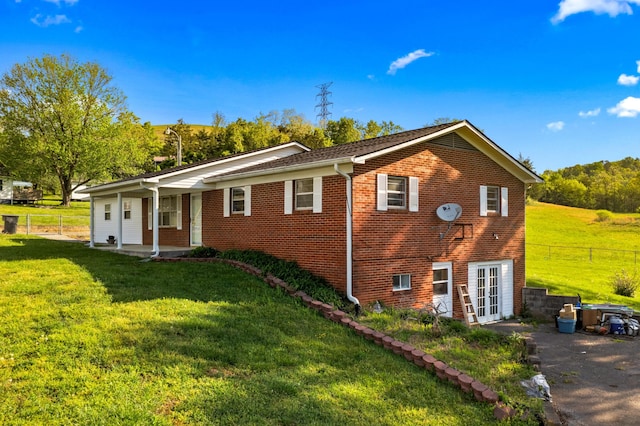 2757 Bethel Rd, Morristown, TN 37813 - view of side of home with french doors, brick siding, and covered porch