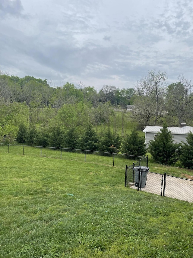 view of yard with fence