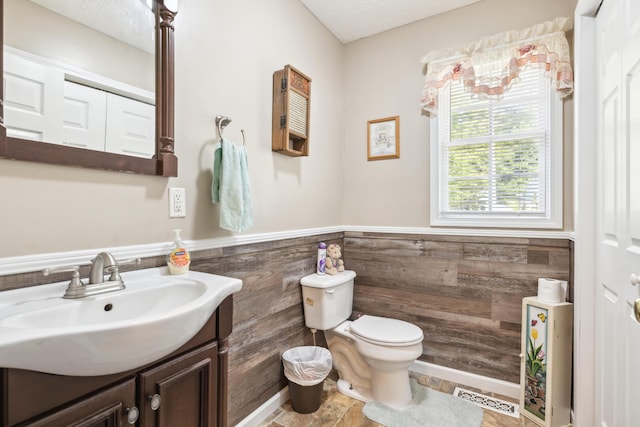 2895 Looney Rd, Parrottsville, TN 37843 - bathroom featuring vanity, toilet, and wainscoting