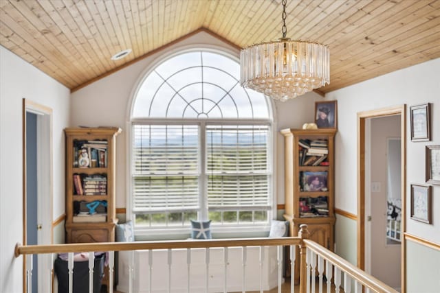 2895 Looney Rd, Parrottsville, TN 37843 - hall with plenty of natural light, a chandelier, vaulted ceiling, an upstairs landing, and wood ceiling
