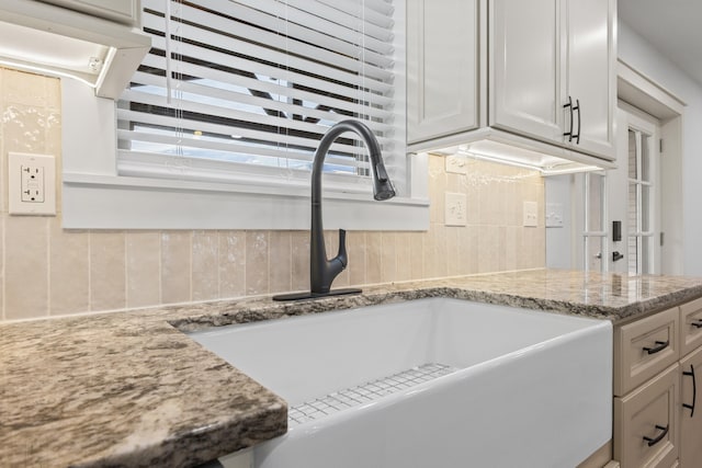 300 Victor Ln, Whitesburg, TN 37891 - kitchen view of a sink, light stone countertops, and backsplash