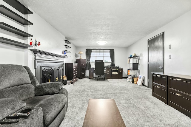 living room with a fireplace, carpet, and a textured ceiling