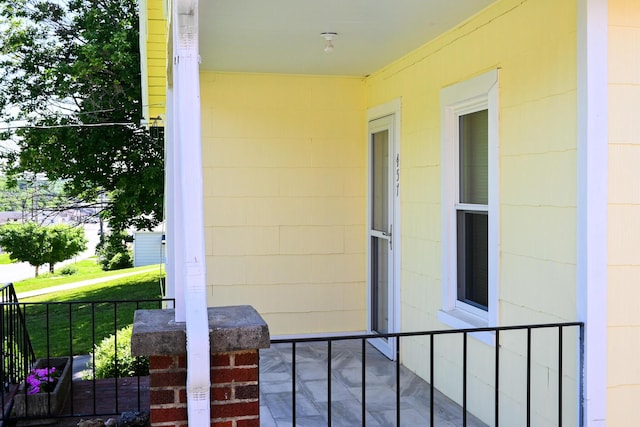 balcony featuring a porch