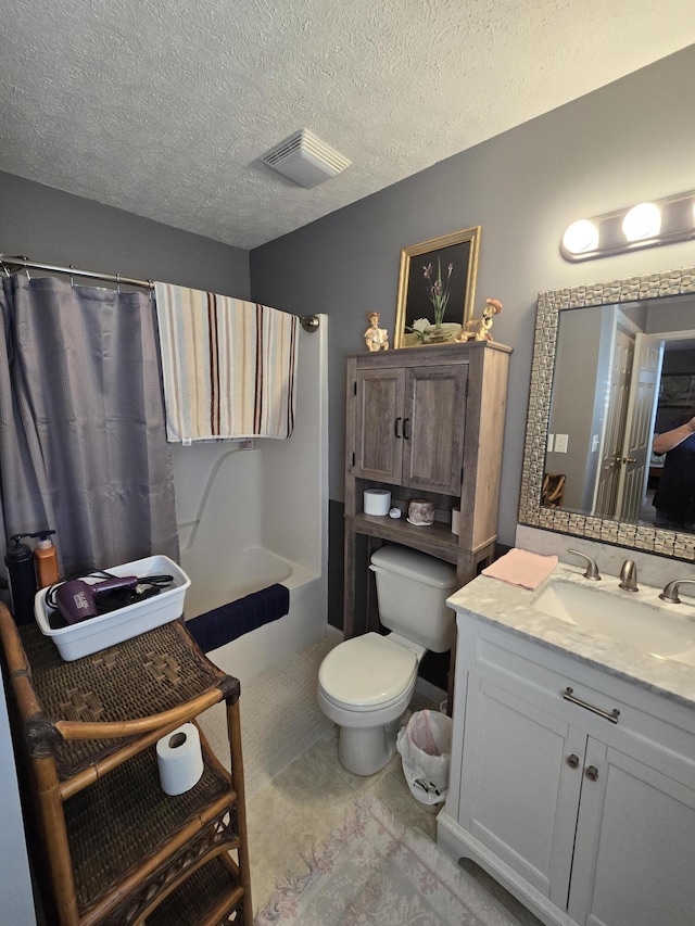 bathroom featuring visible vents, toilet, curtained shower, a textured ceiling, and vanity