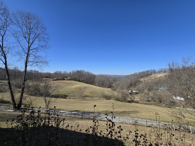 view of mountain feature with a rural view