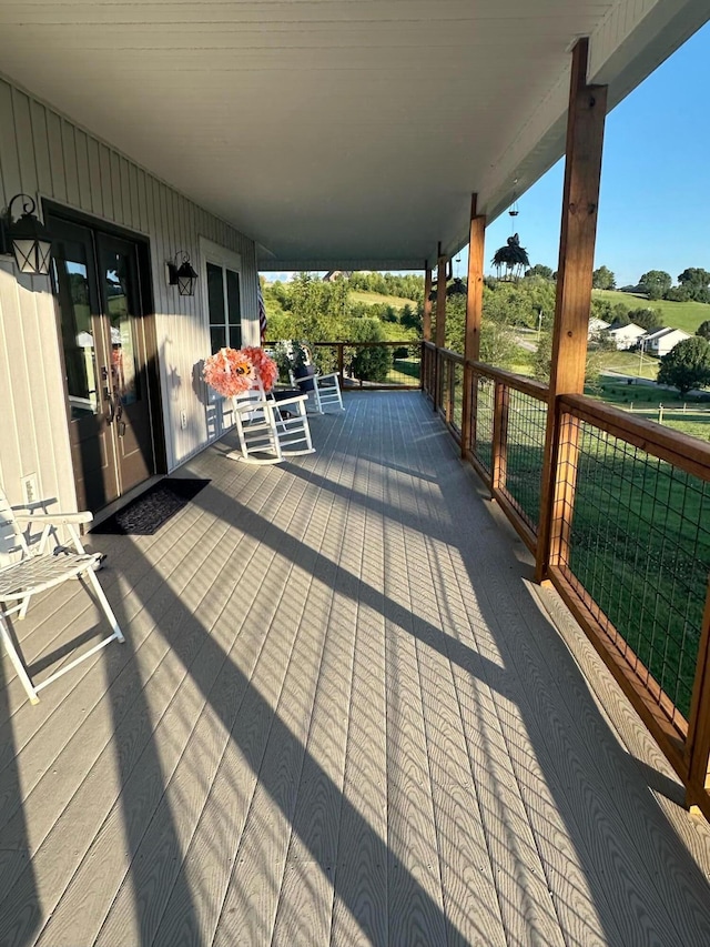 wooden terrace featuring french doors