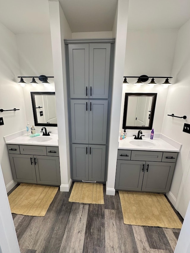 bathroom featuring hardwood / wood-style flooring and vanity