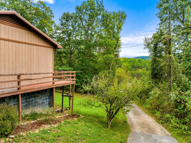 view of yard featuring a deck