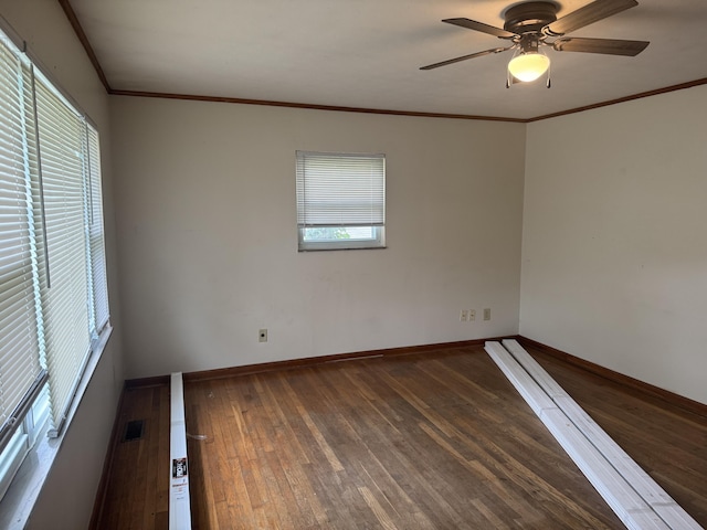 838 Pineridge Rd, Dandridge, TN 37725 - unfurnished room with dark wood-style flooring, ceiling fan, and crown molding