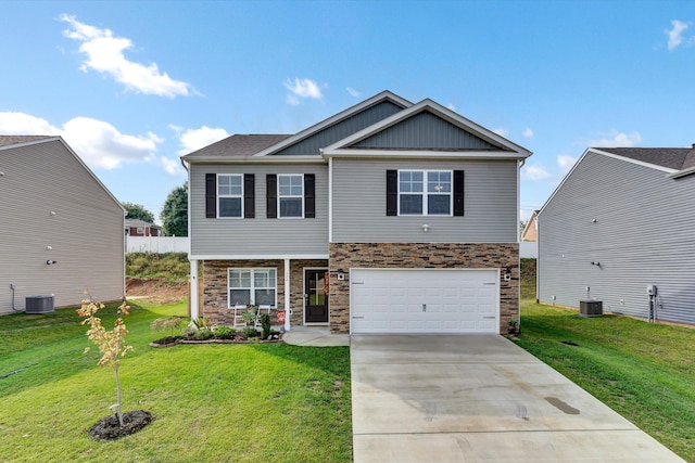 craftsman house featuring cooling unit, a front lawn, and a garage