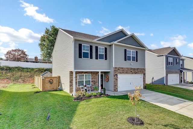 view of front of house featuring a front lawn and a garage