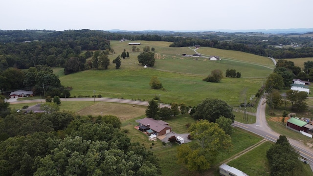 birds eye view of property featuring a rural view