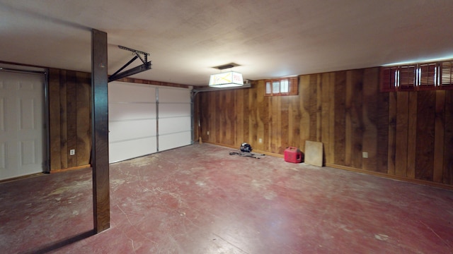 garage with wood walls