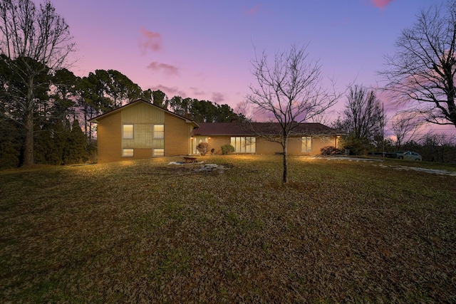 exterior space with a lawn