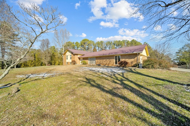 exterior space with a front lawn