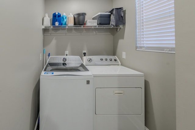 washroom with washer and clothes dryer