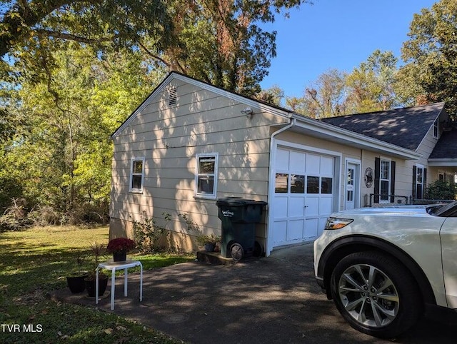 view of home's exterior with a garage