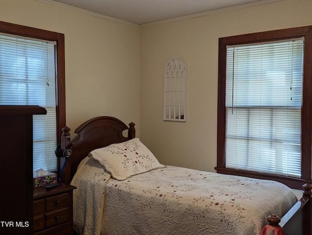 bedroom featuring ornamental molding