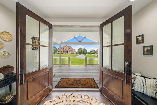 entryway featuring french doors and hardwood / wood-style flooring