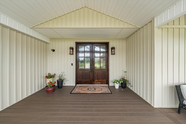 view of exterior entry featuring french doors