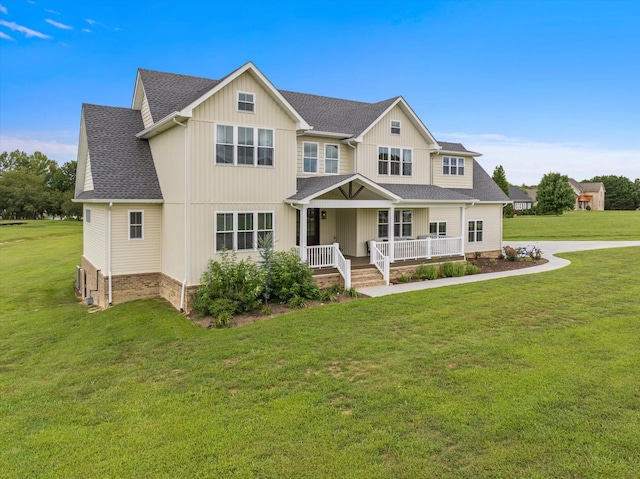 craftsman-style house featuring a front yard and a porch