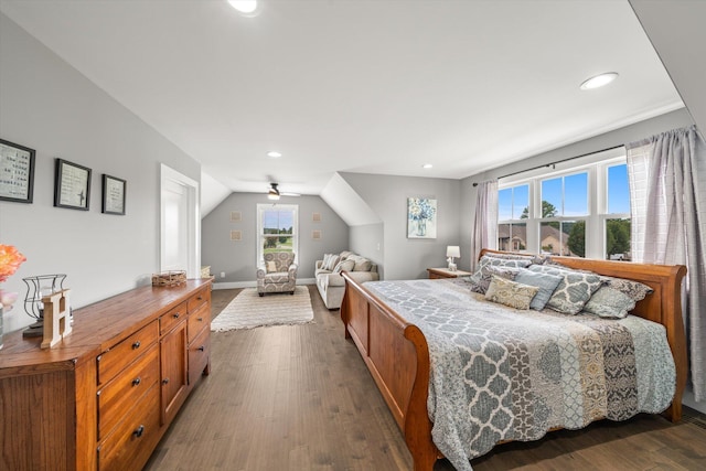 bedroom with lofted ceiling and dark wood-type flooring