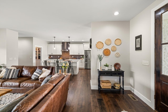 living room featuring dark hardwood / wood-style flooring