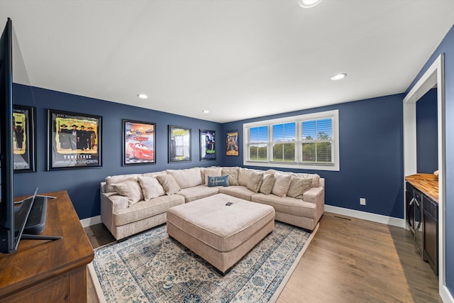 living room with hardwood / wood-style floors