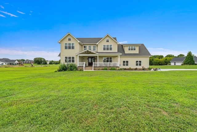 view of front of house featuring covered porch and a front lawn