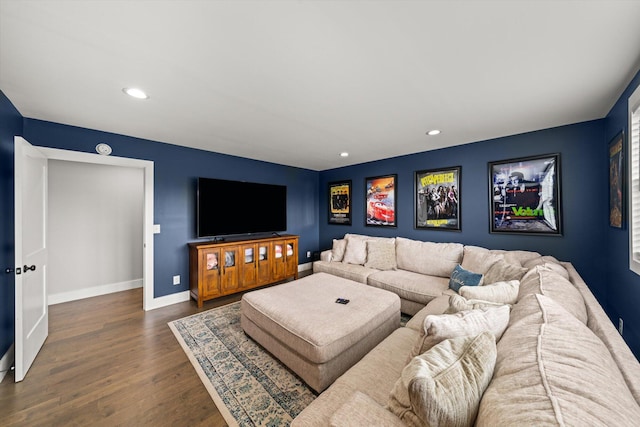 living room with dark hardwood / wood-style flooring