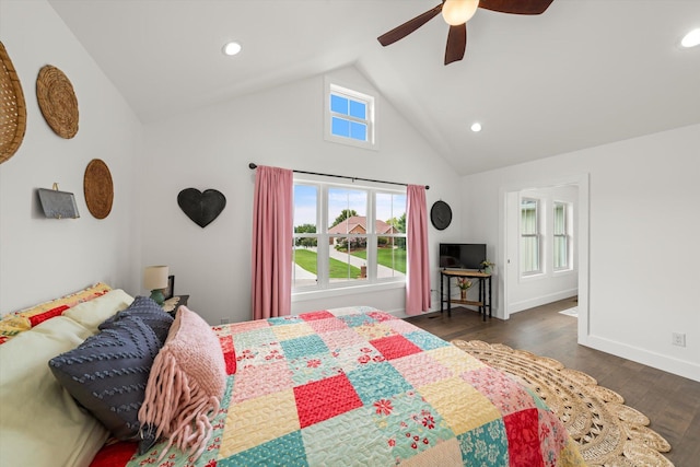 bedroom featuring ceiling fan, dark hardwood / wood-style flooring, and lofted ceiling