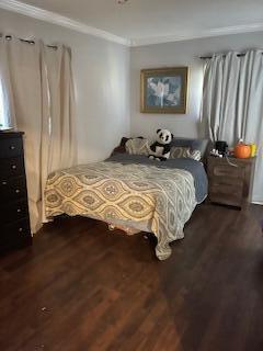 2115 Eastview Ave, Jefferson City, TN 37760 - bedroom with ornamental molding and dark wood-type flooring